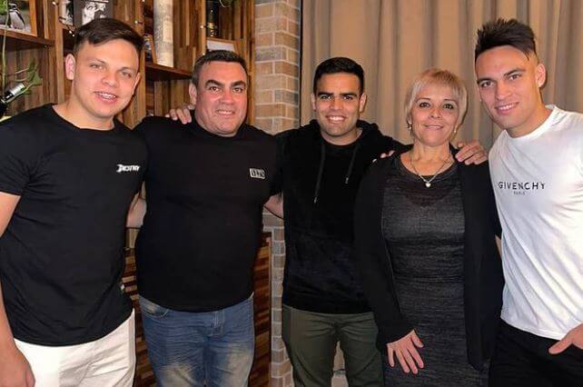 Karina Vanesa Gutierrez with her husband and sons Jano, Alan and Lautaro Martinez.